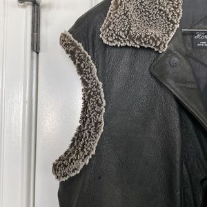 Henig Furs leather vest with shearling collar and trim.  NWOT.
